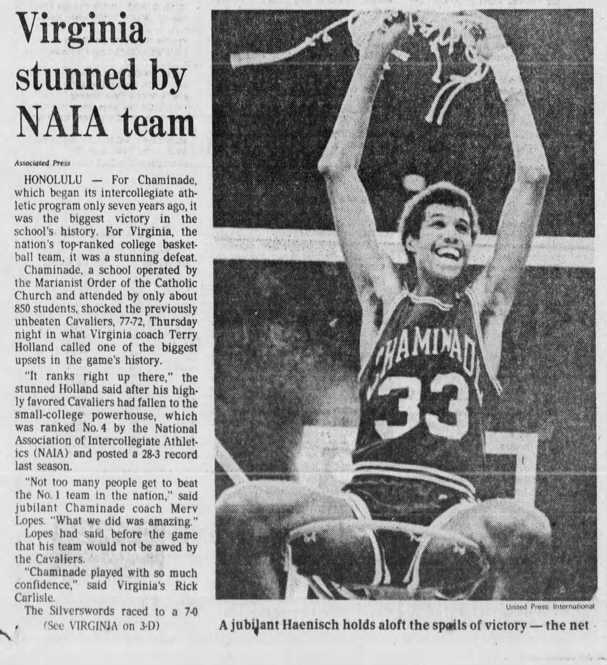 Richard Haenisch sits on the rim.