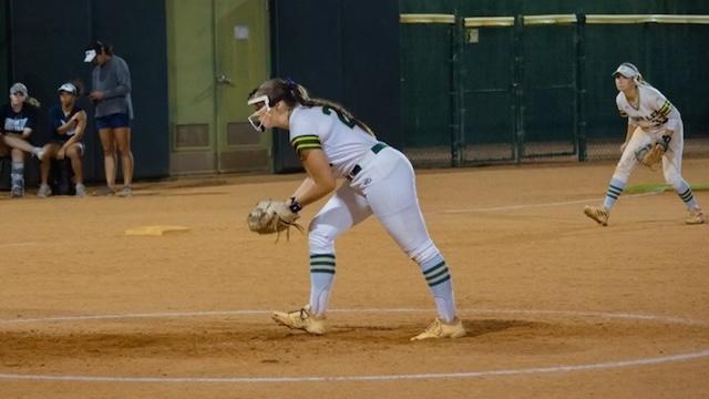 A Saint Leo softball pitcher delivers the pitch.