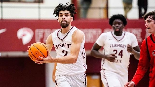 Fairmont State controls the ball in DII men's basketball. 